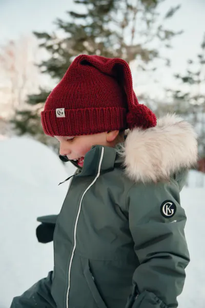 Gullkorn design,  nisselue ull dyp rød